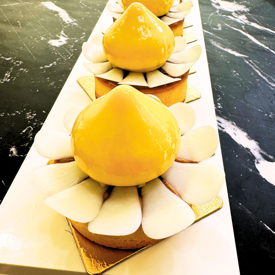 Mango tart with sunflower seed praline